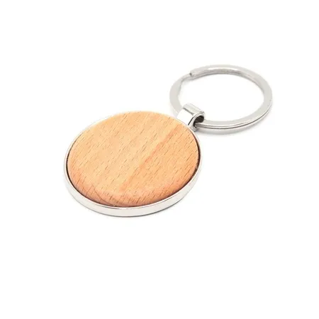 Брелок Woody R(круг), натуральный с логотипом компании. Цена 177 ₽. Артикул ARDN12021X.19